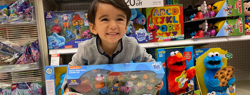 Child Shopping for Toys